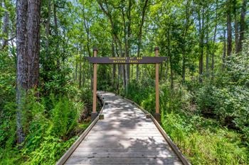 2 Miles from 15,000 acres of scenic hiking trails & lakes